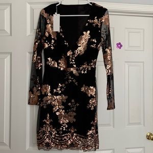 Short black with sparkly gold pink dress.